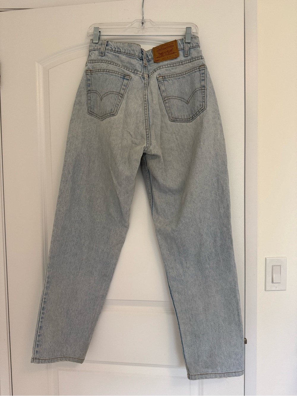Levi's 560 light wash high rise tapered leg jeans